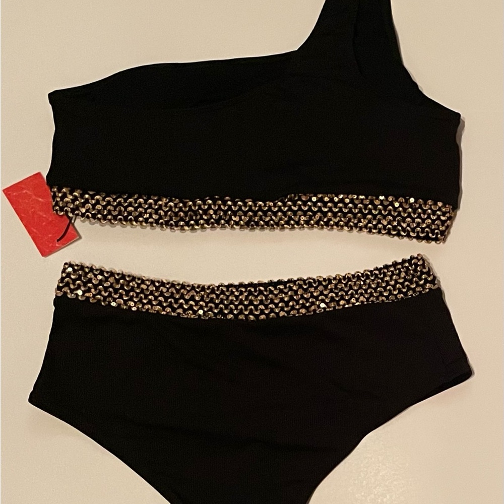 Two piece bathing suit. Never worn.